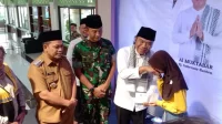 Al Muktabar Serahkan Bantuan Ormas