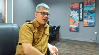 Tiga Perusahaan