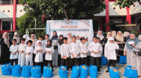 SDN Larangan 11 Kota Tangerang Santuni 64 Anak Yatim, Piatu, dan Dhuafa